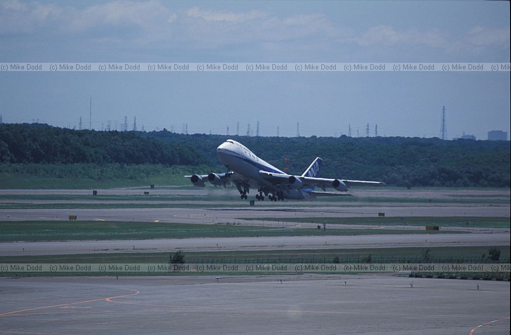 ANA Boeing 747 jumbo jet taking off Sapporo