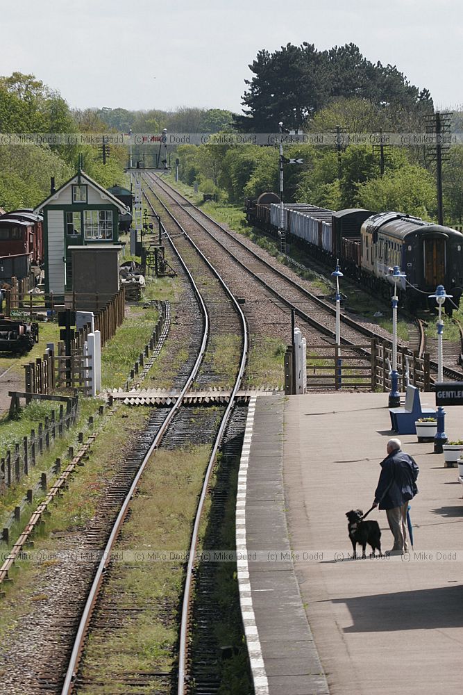 One man and his dog waiting for a train at Quorndon station