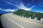 road to the top of Whiteface mountain Adirondacks New York state and cirrus clouds
