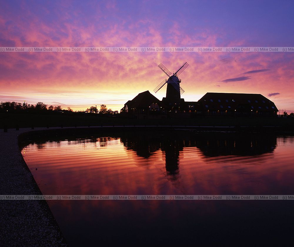 Caldecotte pub with false windmill Milton Keynes sunset