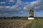Pitstone windmill with ploughed field